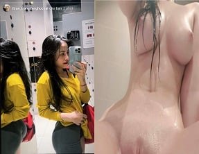 Tran Ha Linh mostra sua figura sexy em um vestido de renda branca